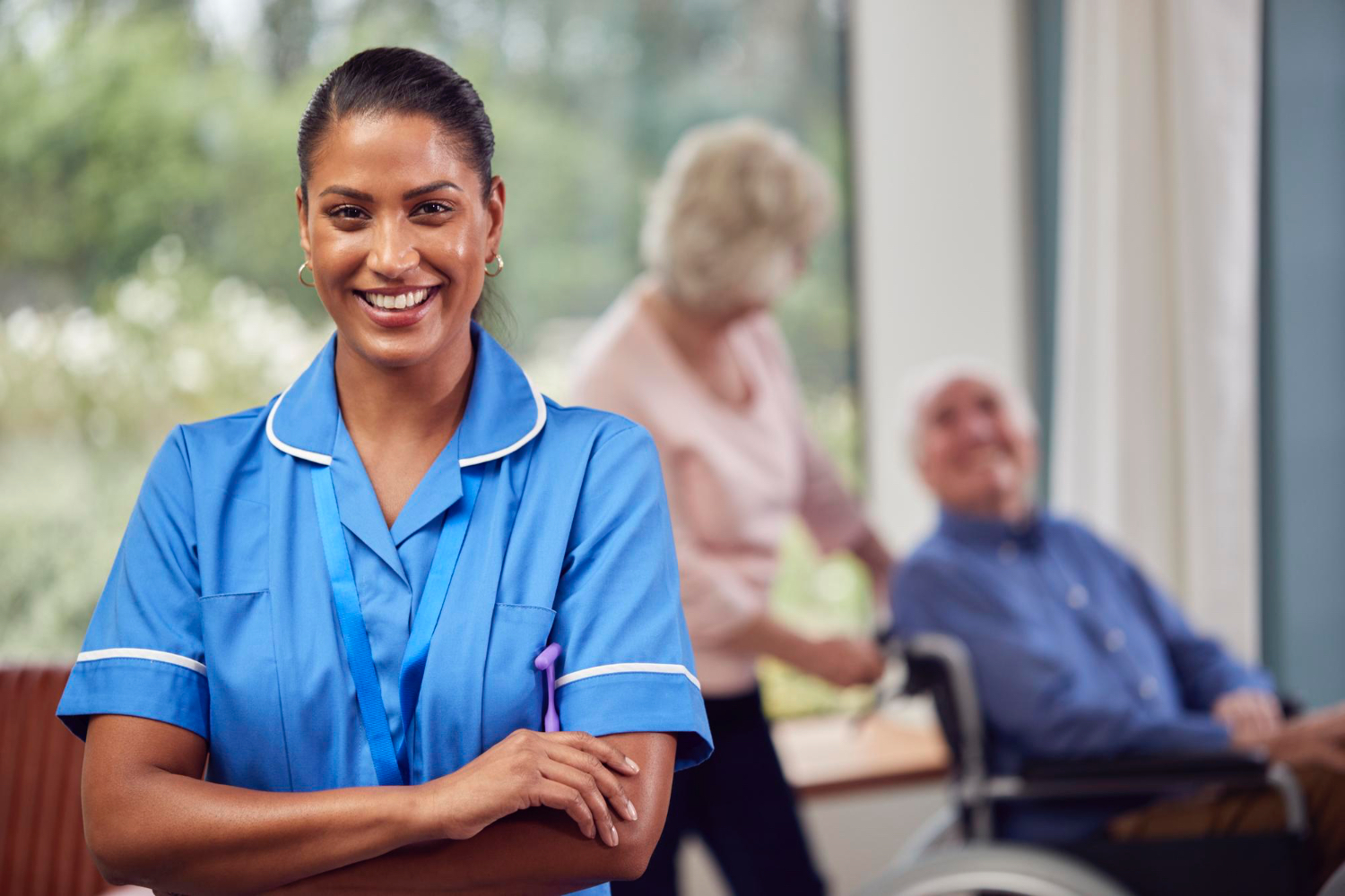 portrait-female-nurse-care-worker-making-home-visit-senior-couple-with-man-wheelchair